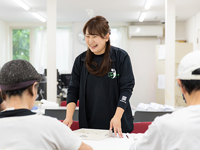写真：菅野さんの勤務風景